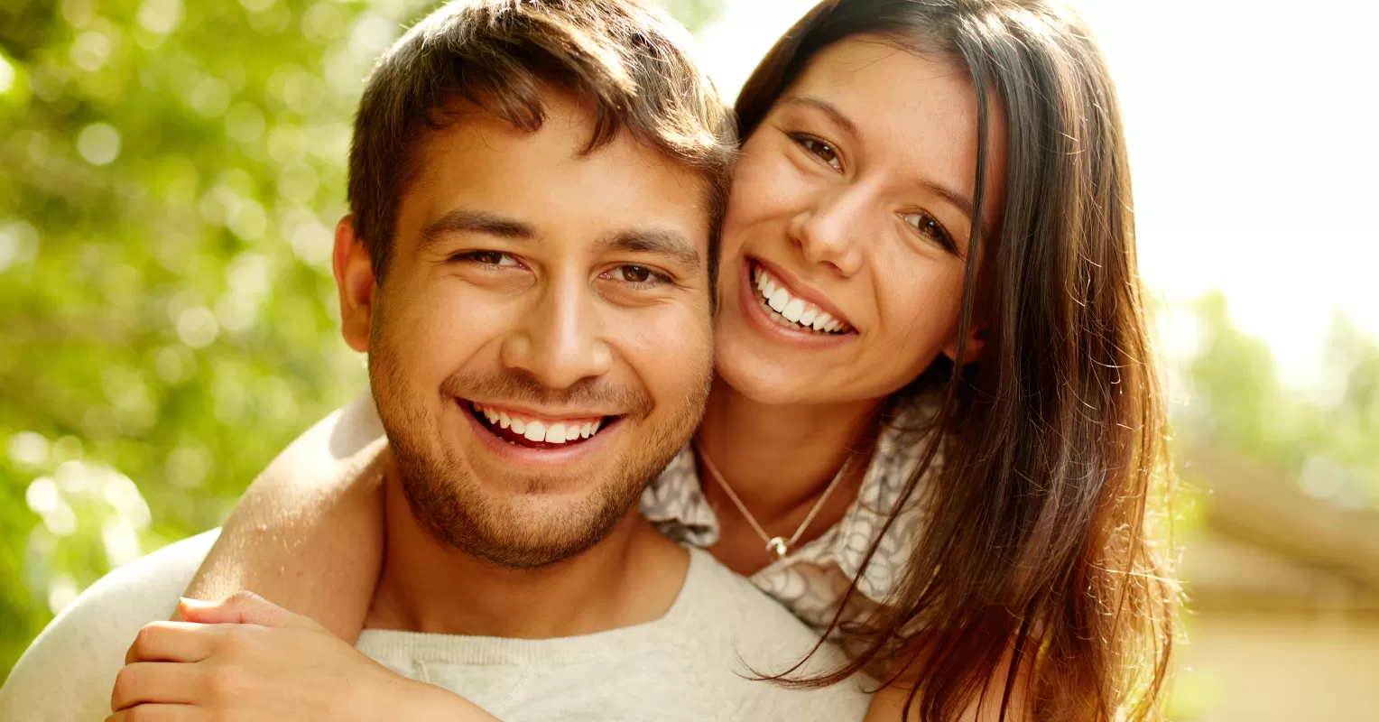 Couple engaged in deep conversation, reflecting on commitment signals in their marriage