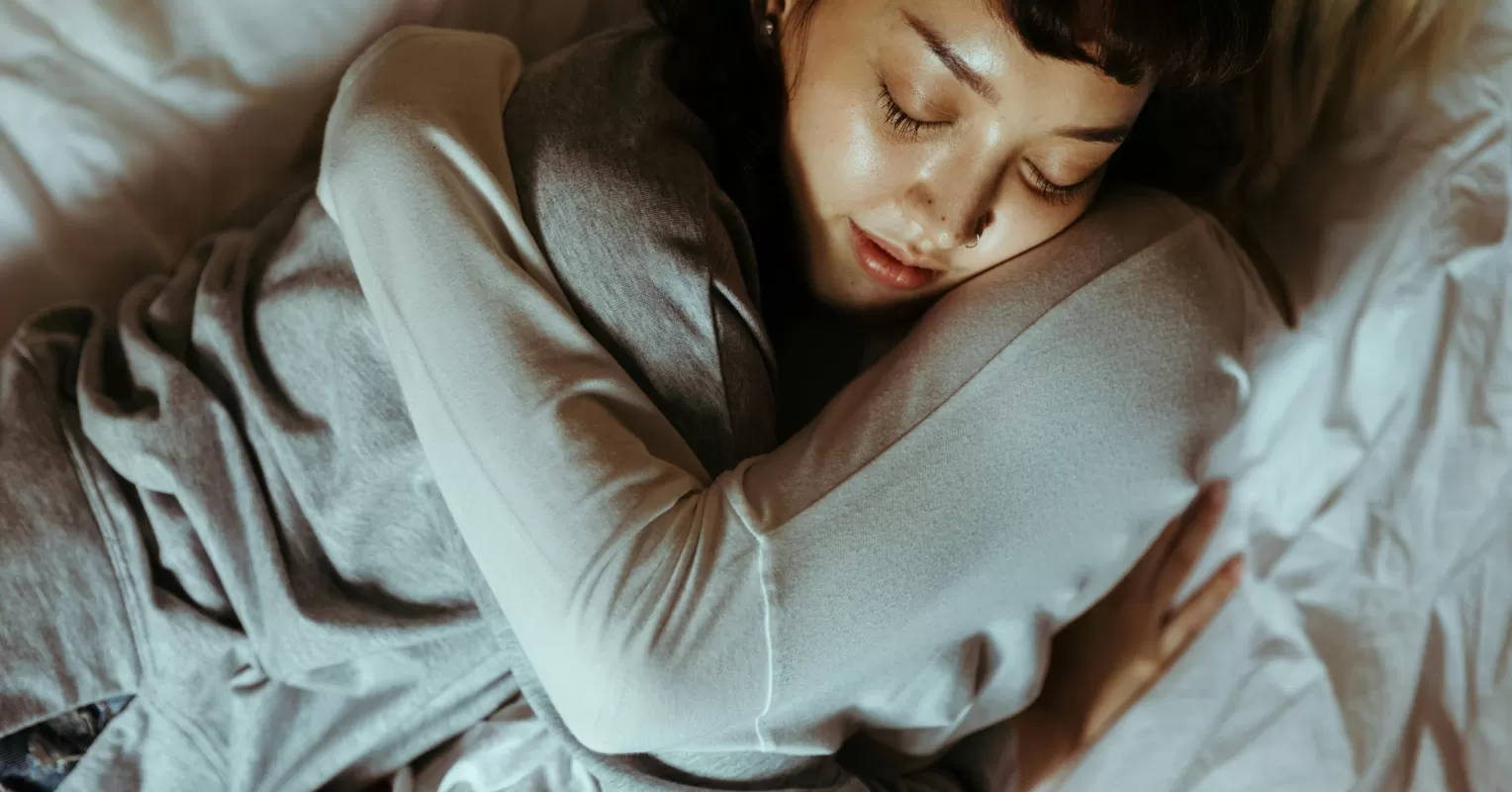 A person contemplating their reactions in relationships shaped by childhood trauma.