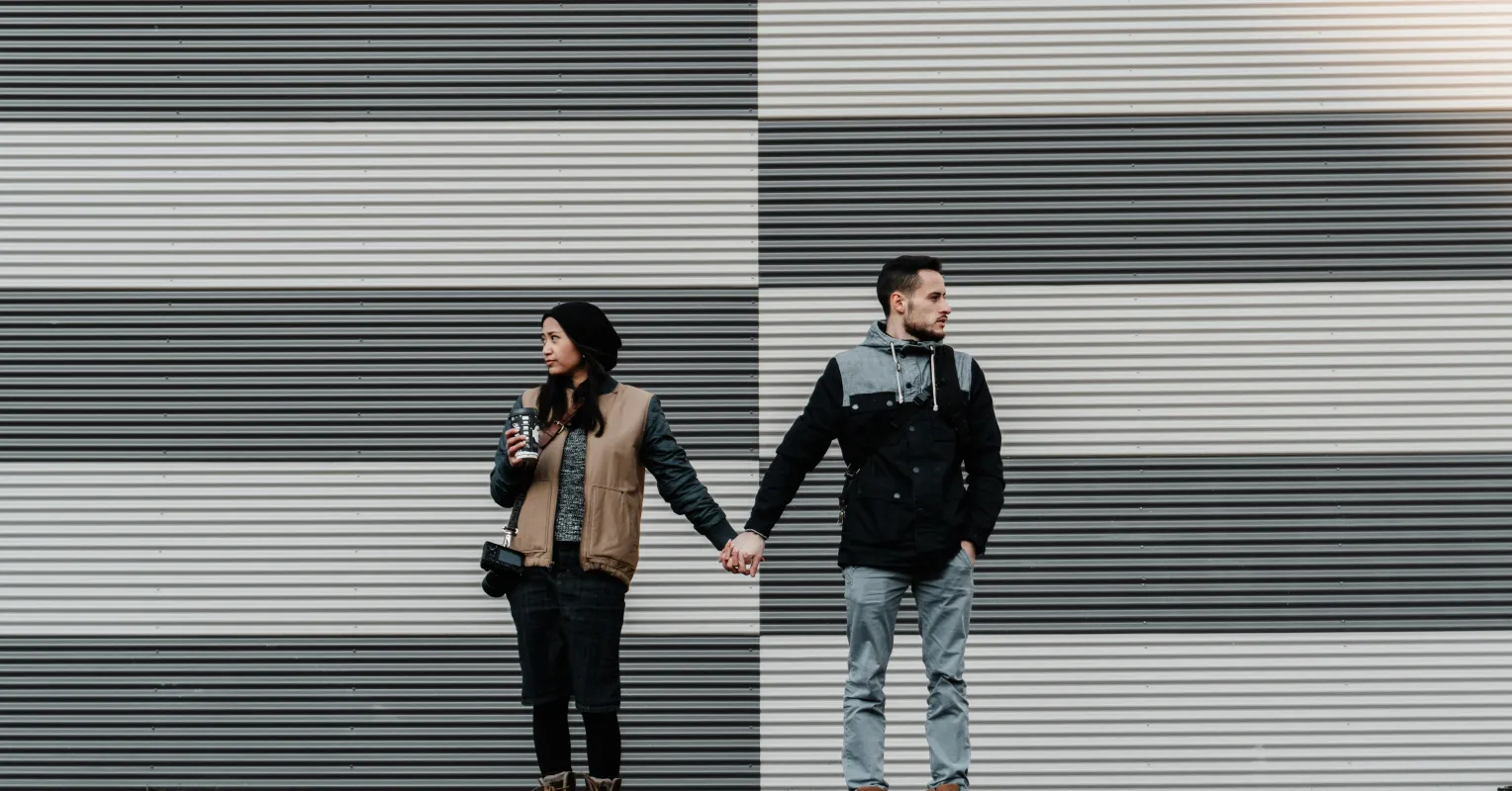 Couple sitting in silence, highlighting unspoken fears in their relationship