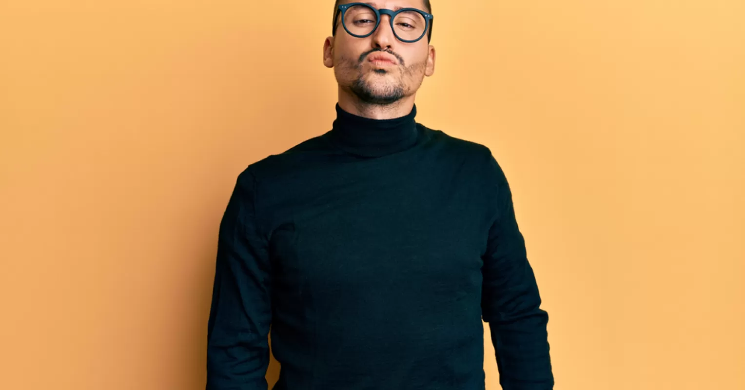 Person reflecting on emotional behavior and meaning connected to how to be confident without being arrogant