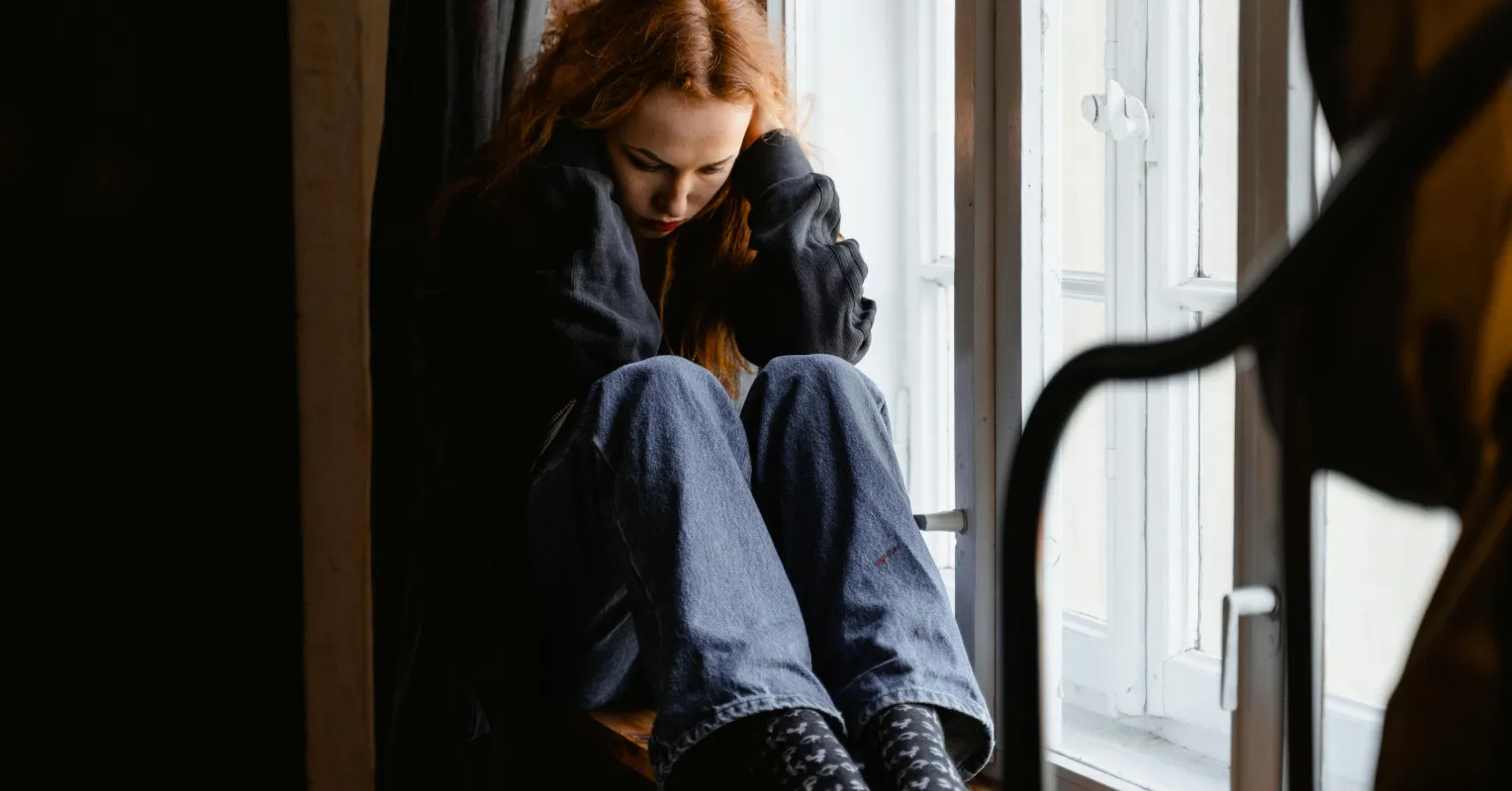 Individual recognizing signs of emotional abuse in a difficult relationship