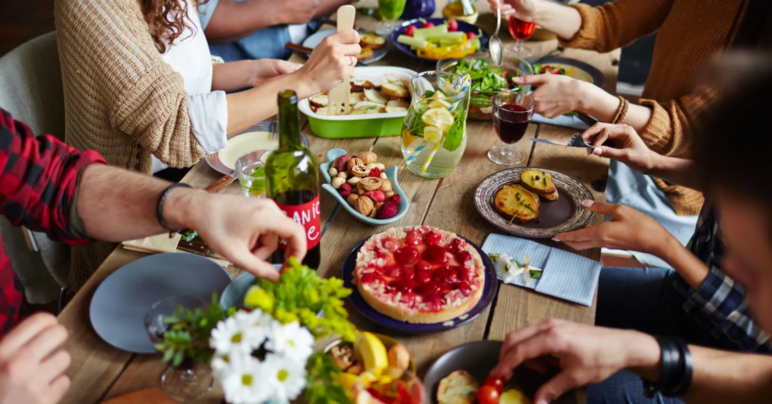 Individual setting boundaries while discussing family dynamics during a tense holiday gathering