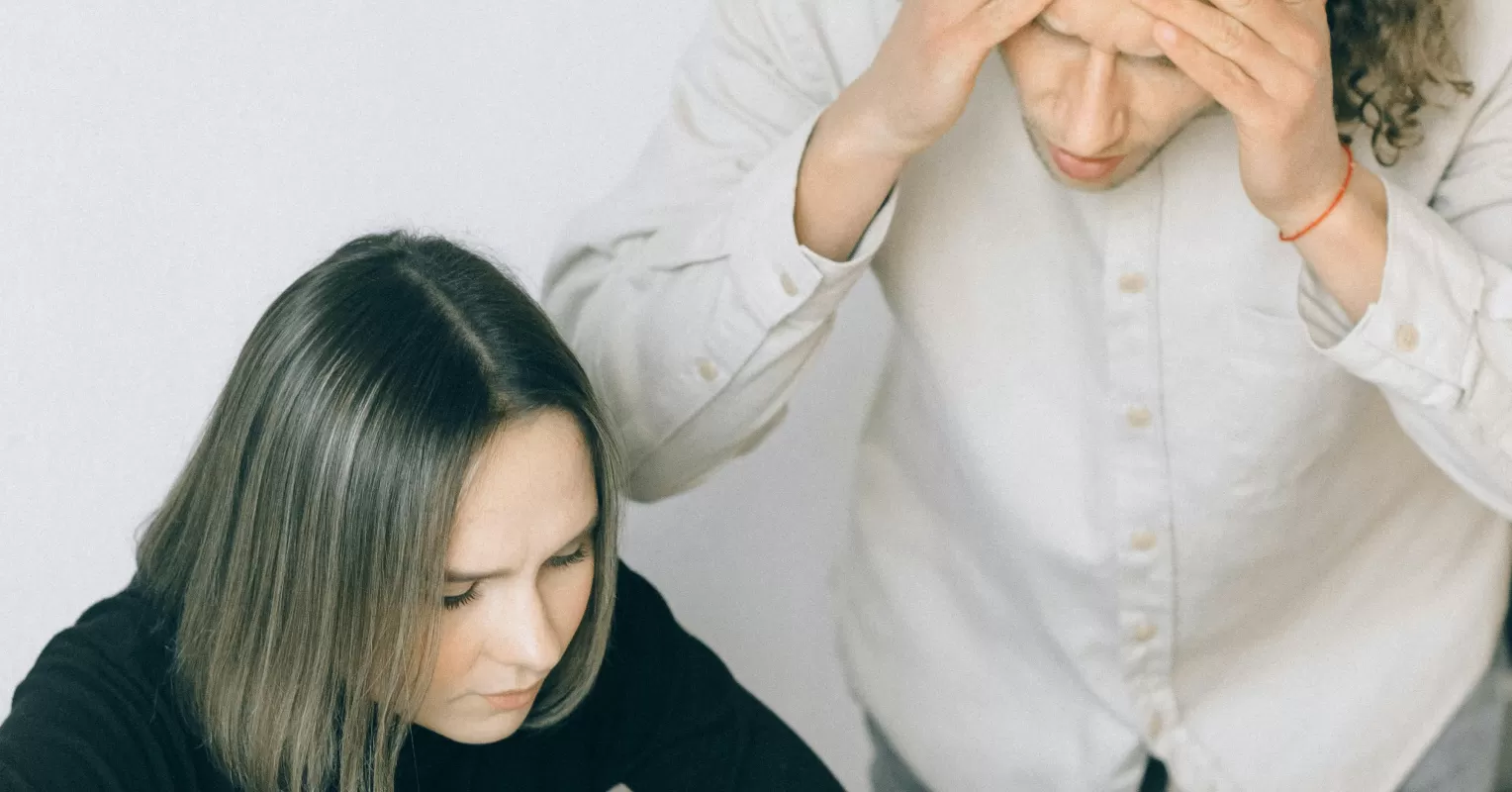 Couple having an open conversation about finances, overcoming feelings of shame in their relationship