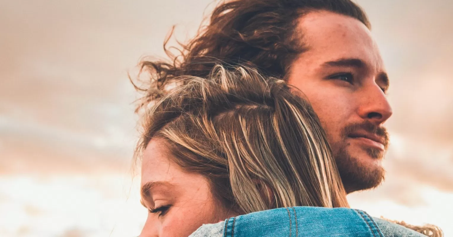 Individual contemplating feelings after the end of a long-term relationship
