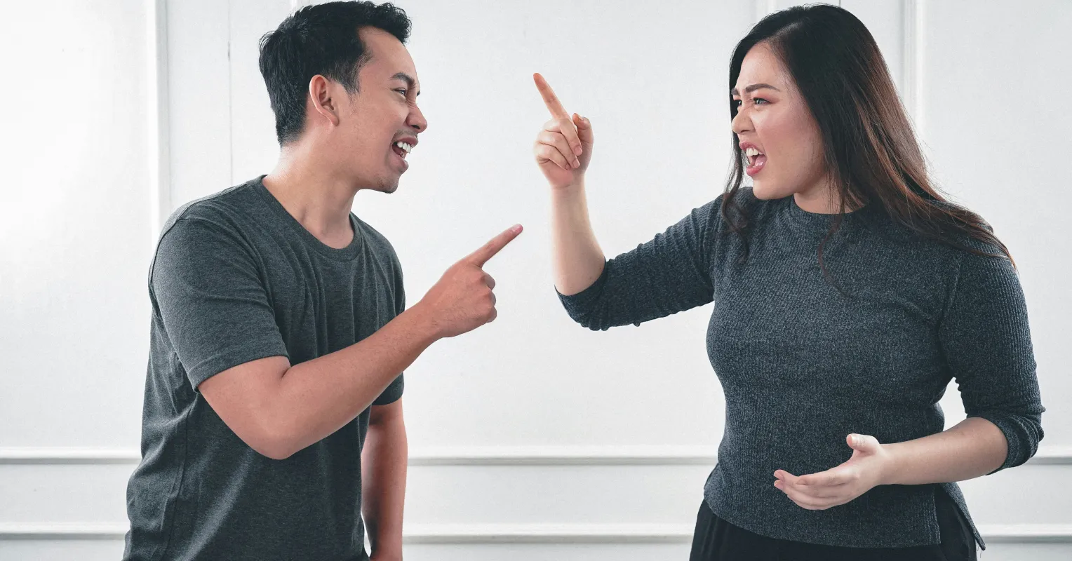 Person reflecting on uncertainty in a relationship connected to how to handle criticism from a partner without feeling