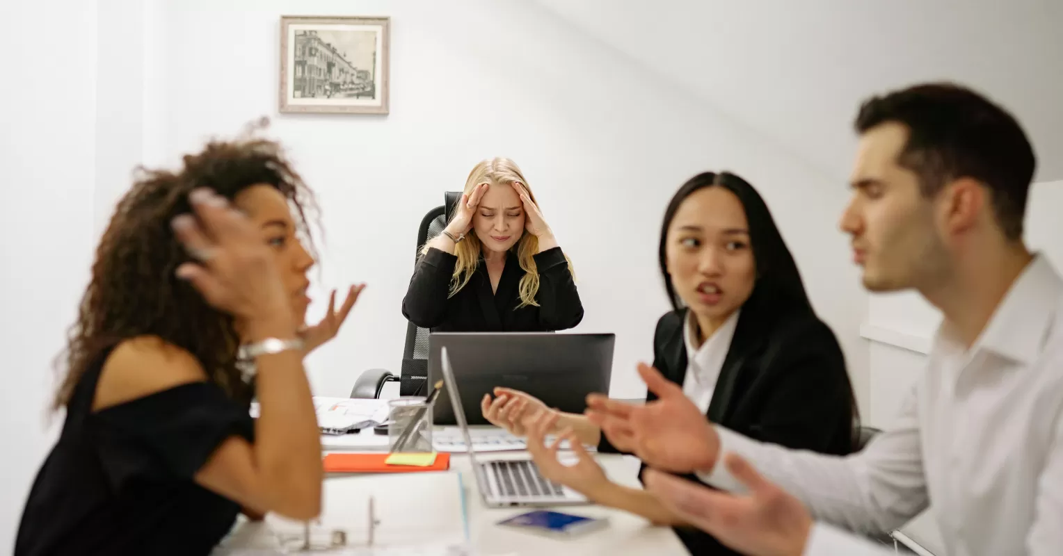 Person reflecting on emotional behavior and meaning connected to how to handle disagreements with coworkers