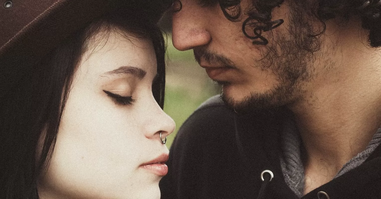 Couple discussing trust issues, exploring how to move forward after betrayal