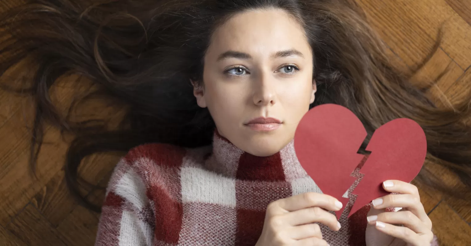 Individual rediscovering their confidence after a relationship ends, surrounded by supportive friends