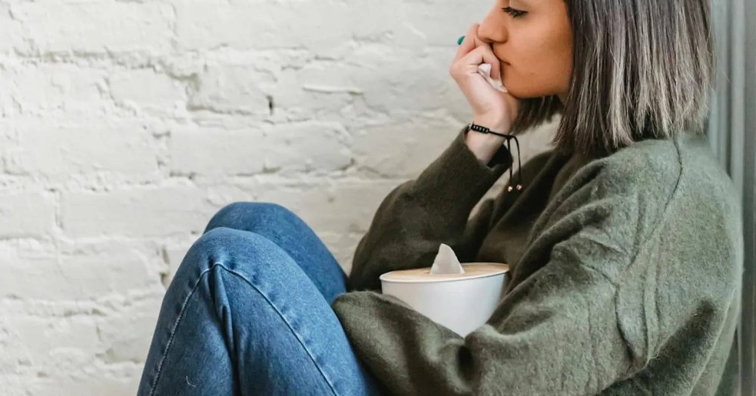 A person contemplating how to respond to emotional manipulation in a relationship