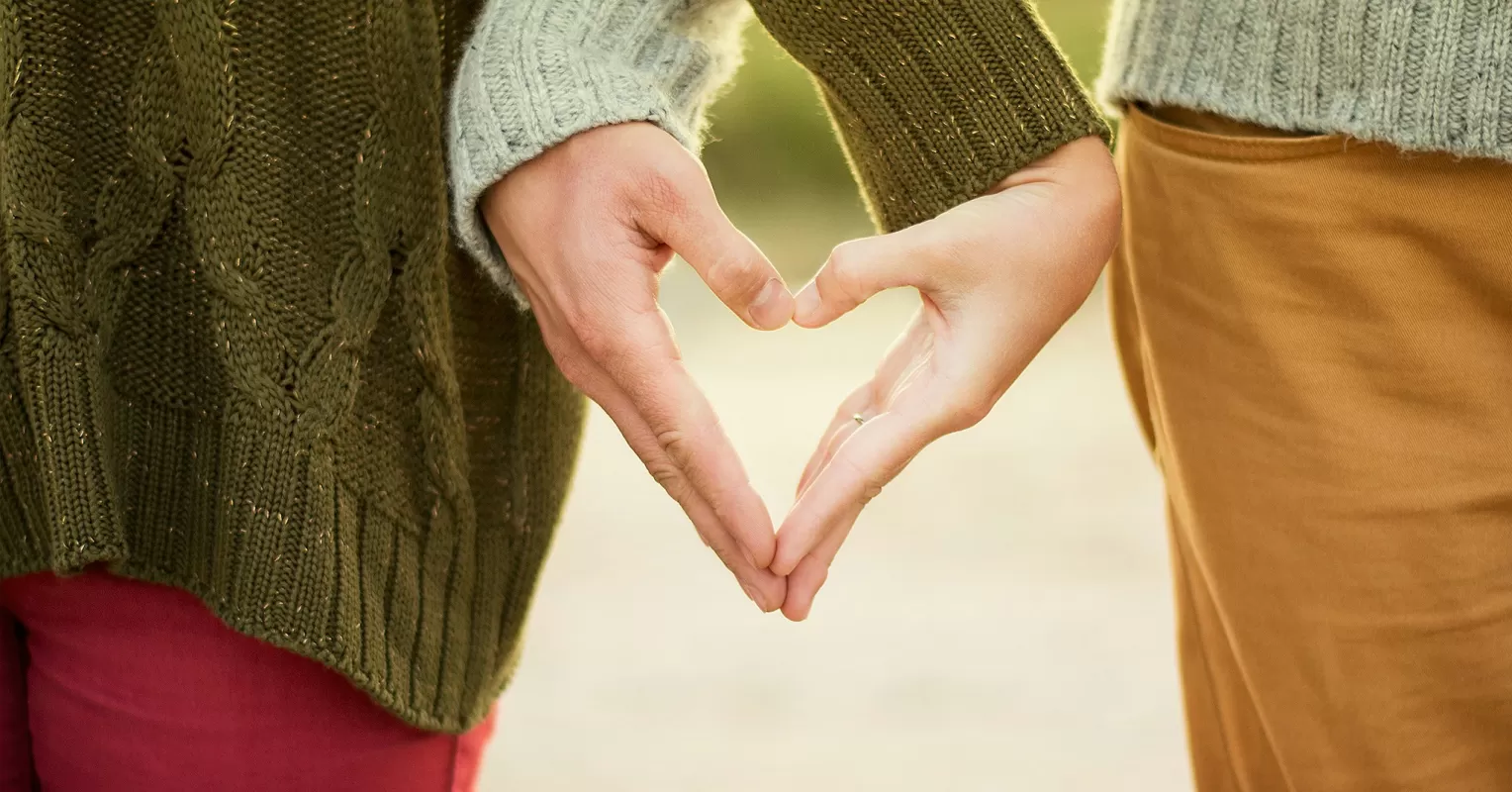 A comforting friend offering support to a grieving individual in a heartfelt moment