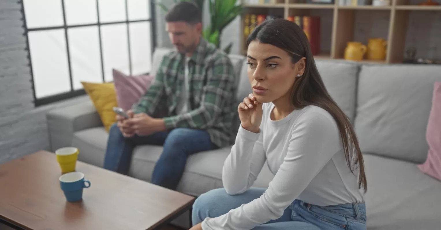 Friend offering comfort to a person struggling with emotions after a breakup