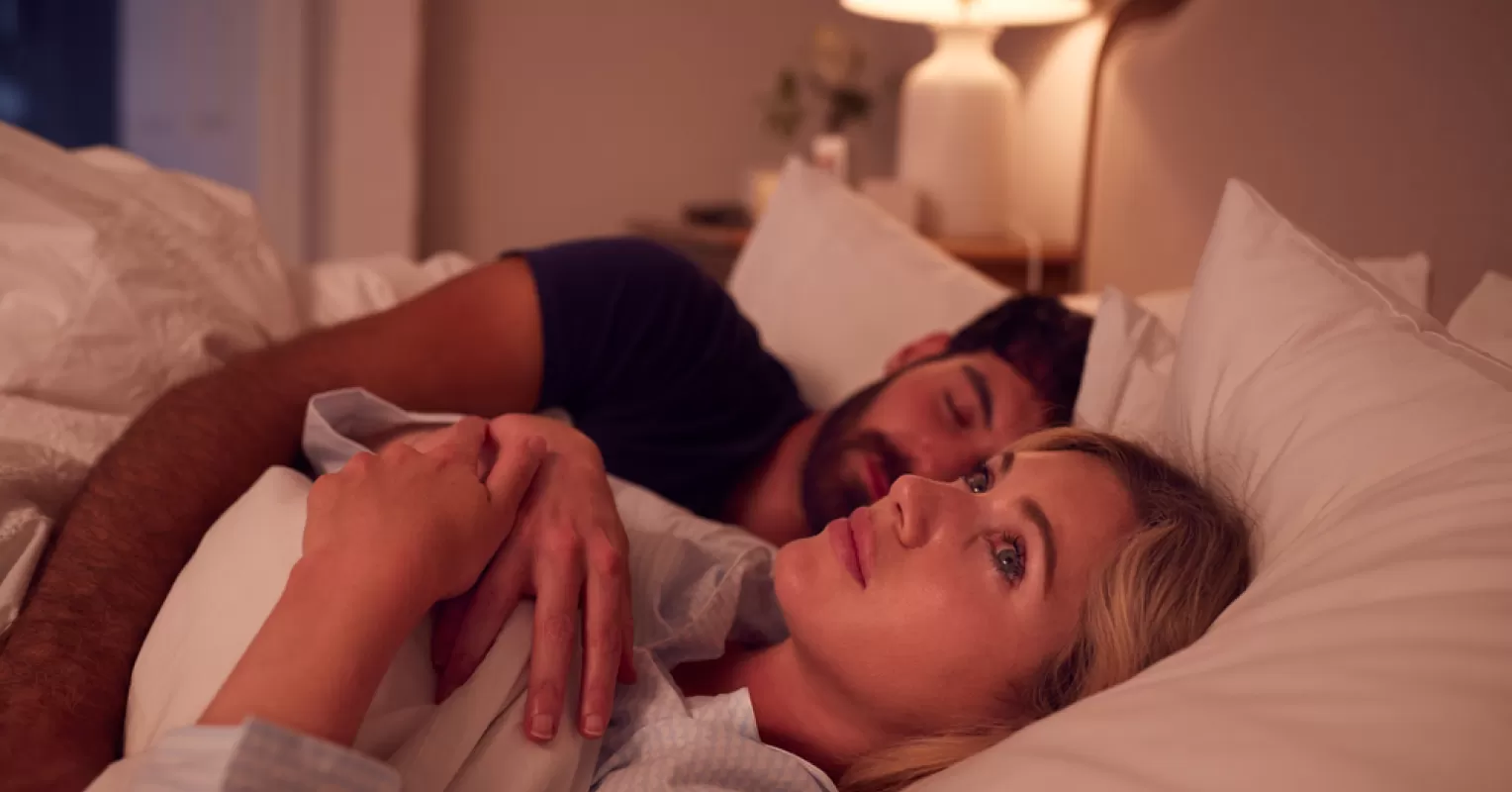 Couple sharing a moment of intimacy while grappling with situationship uncertainty