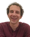 Man appearing withdrawn and distant, reflecting avoidance of intimacy after a breakup