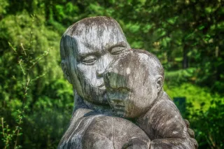 Parent reflecting on guilt patterns passed down from their parents in parenting