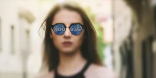 Person feeling anxious while viewing their ex's profile on social media