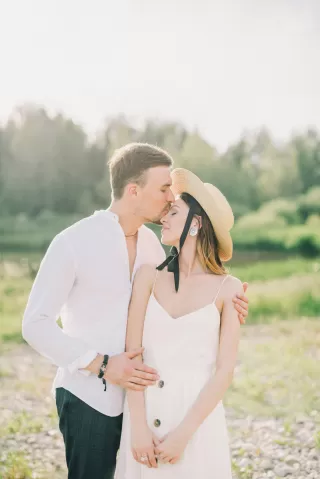 A couple in a loving embrace despite visible tension, illustrating relationship signals and compatibility issues
