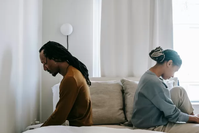 Individual experiencing emotional intensity during an argument with their partner