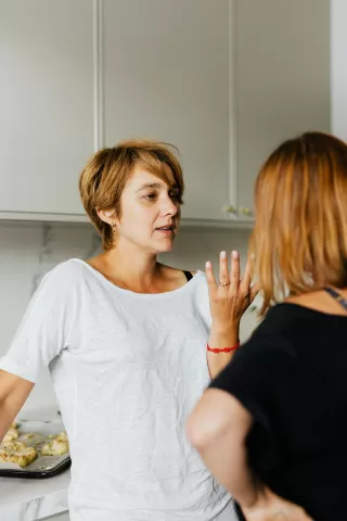 A family discussing uncomfortable truths, revealing the signals behind labeling truth-tellers as troublemakers.