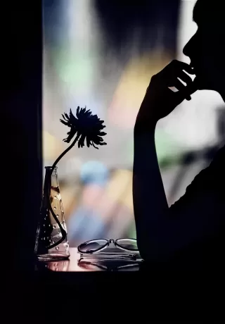 Person reflecting on emotional behavior and meaning connected to how to handle an ex who wont let go