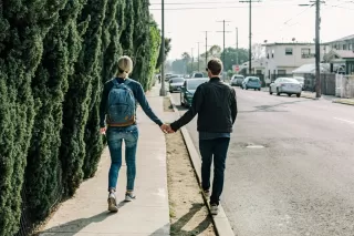 Person reflecting on uncertainty in a relationship connected to your partner feels distant after change