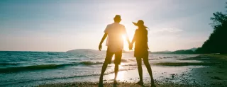 Couple engaged in deep conversation, highlighting signs of emotional insecurity related to their age gap.