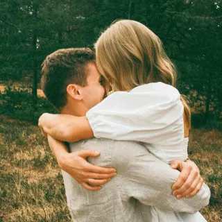 Person reflecting on uncertainty in a relationship connected to what are the signs my partner is not emotionally