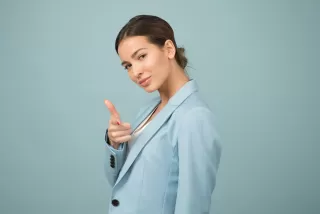 Person contemplating feelings of guilt after disagreeing with a friend