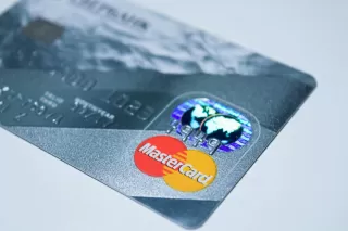 Person reflecting on uncertainty in a relationship connected to people hide their spending from their partners