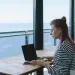 Individual crafting a fake online profile, exploring hidden motivations in dating behaviors