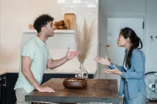 Family members engaged in a tense but respectful conversation about differing political views