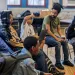 Child looking withdrawn in a classroom, highlighting red flags of disconnection at school