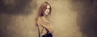 Person reflecting on emotional behavior and meaning connected to how to stop obsessing over an ex