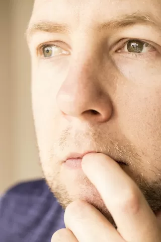 Person offering support to a friend in need without appearing judgmental