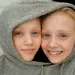 Twins sharing a deep connection while navigating their idealized relationship dynamics