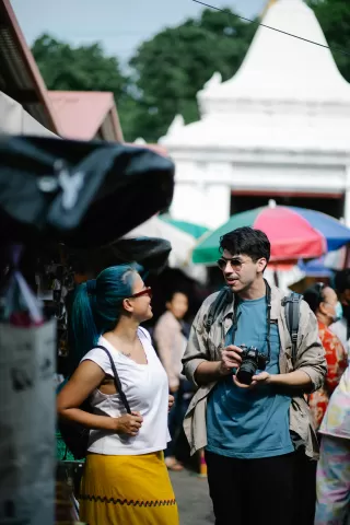 Two people engaged in deep conversation, feeling an immediate bond and connection in social dynamics