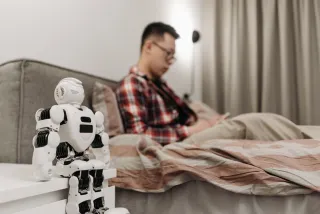 Person selecting AI chat on a smartphone, illustrating preference for AI over human interaction