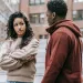 Individual feeling ignored during a conversation, questioning why they feel unheard with their partner