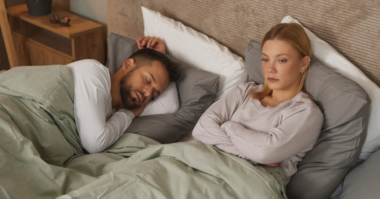 Couple sharing a light-hearted moment while discussing relationship signals and friendship dynamics