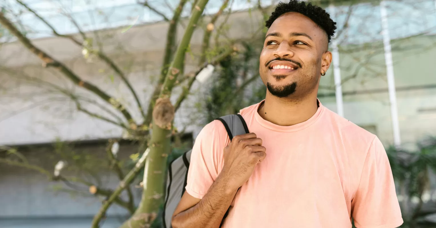 Individual sitting in a tranquil environment, reflecting on learning to enjoy your own company