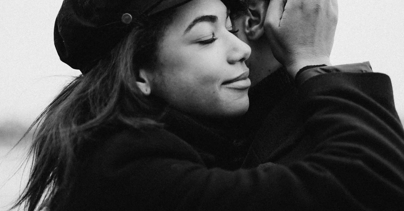 Person reflecting on uncertainty in a relationship connected to what are the signs i need to be kinder