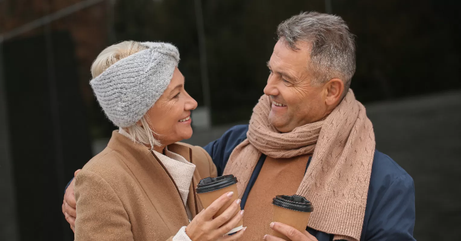 Couple engaged in deep conversation, practicing active listening and strengthening their relationship signals