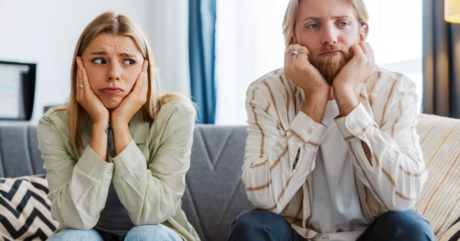 Person reflecting on uncertainty in a relationship connected to what are the signs that i know my partner