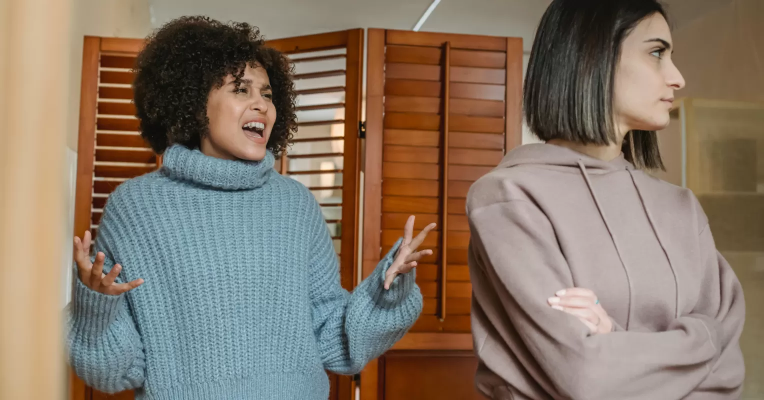 Person looking puzzled after partner dismisses concerns with laughter, signaling possible emotional disconnect.