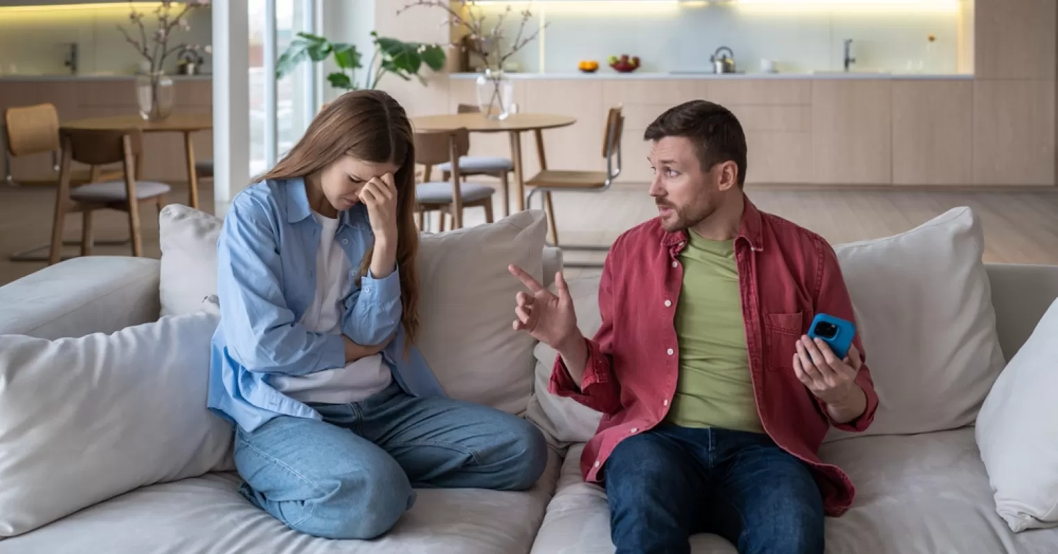 Couple in deep conversation reflecting on expressions of love and commitment