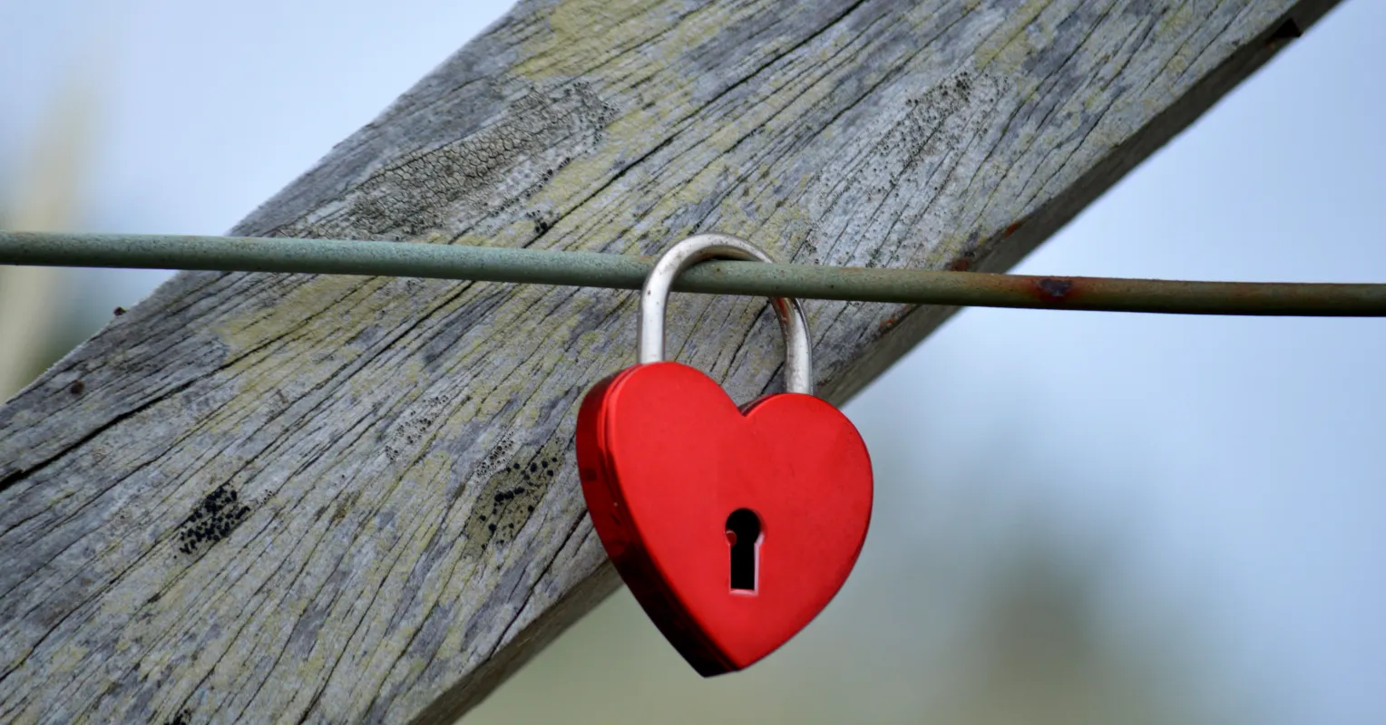 Individual contemplating feelings of attraction to emotional availability in relationships