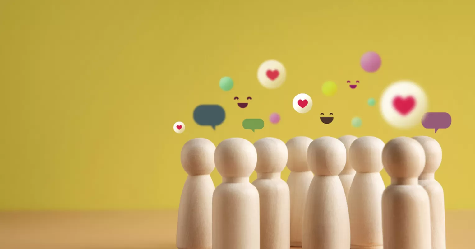 A diverse group discussing relationship dynamics within a large community setting