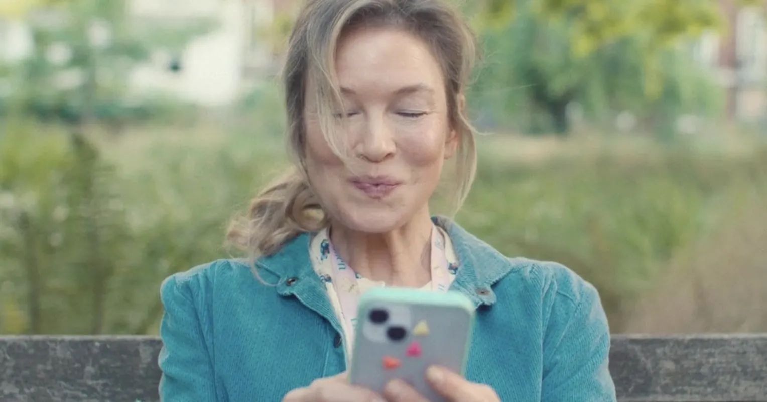 A woman contemplates societal judgments about dating someone younger, reflecting inner struggles.