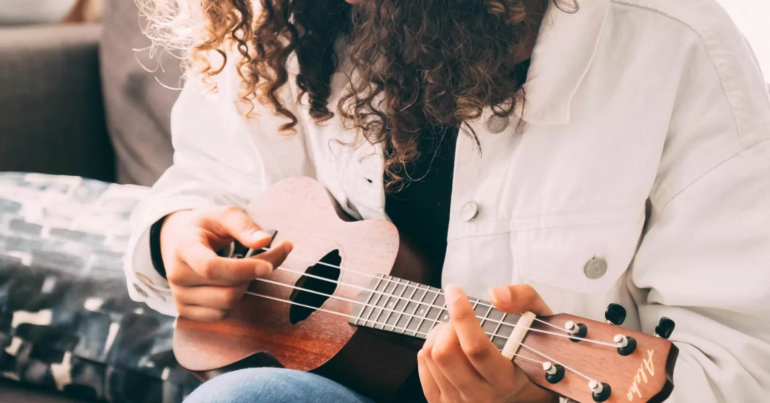 Individual exploring hobbies and interests to rediscover passions after a breakup