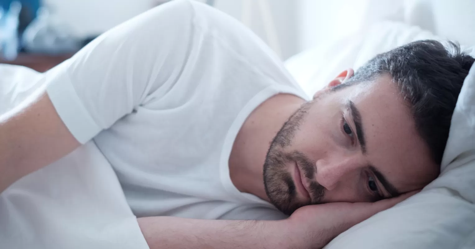 Person reflecting on emotional behavior and meaning connected to what makes breakups more painful for men than women
