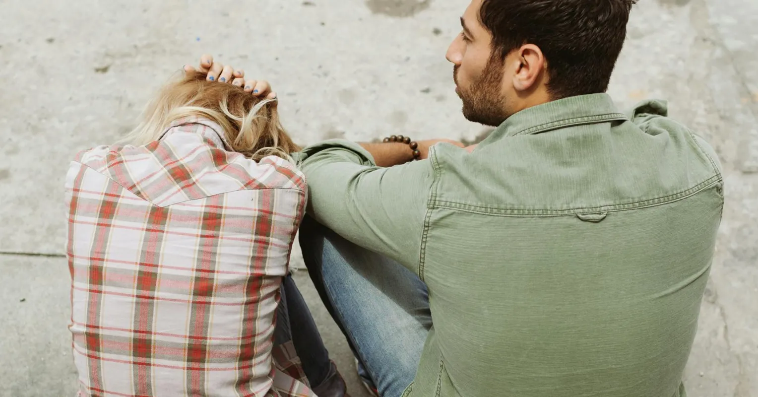 Couple arguing over chores, revealing deeper relationship signals at play.